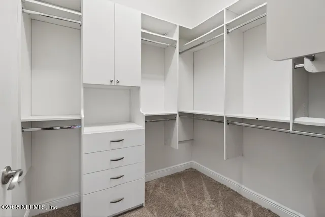 a view of a glass door and a window