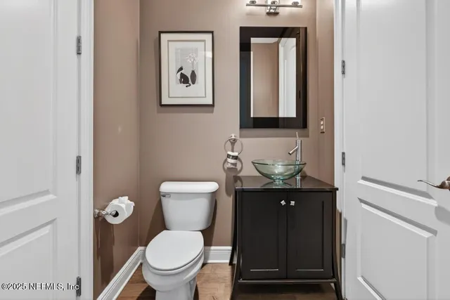 a view of a hallway with white walls