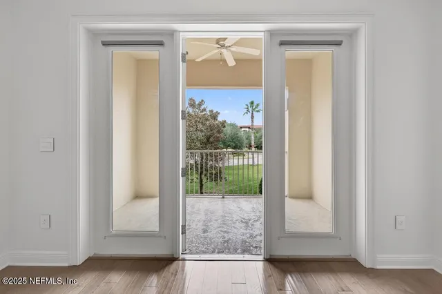 a view of a workspace with a window and couch