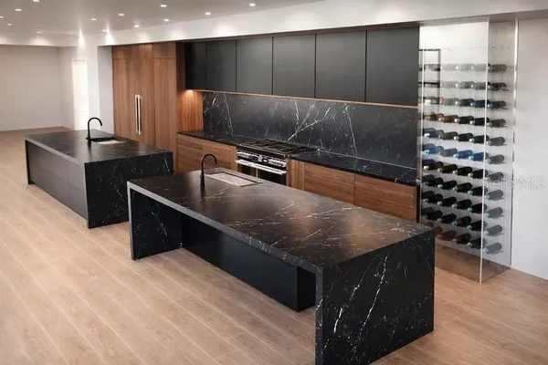 a spacious bathroom with a bathtub sink and mirror