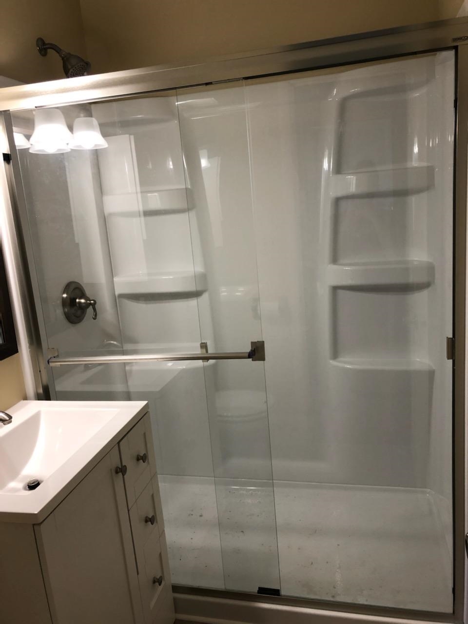 937 West Arrowhead Road Duluth, MN 55811 - Photo 11 of 23 Bathroom with a stall shower and vanity.