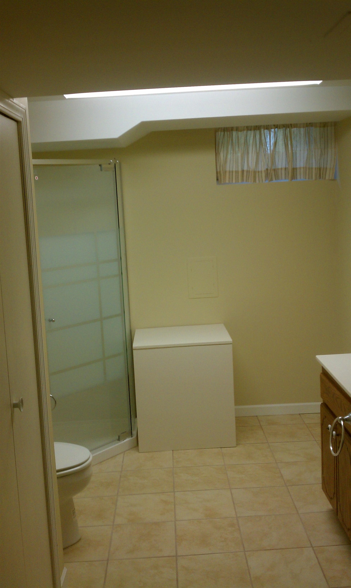 937 West Arrowhead Road Duluth, MN 55811 - Photo 14 of 23 Bathroom with vanity, light tile patterned floors, and a stall shower.