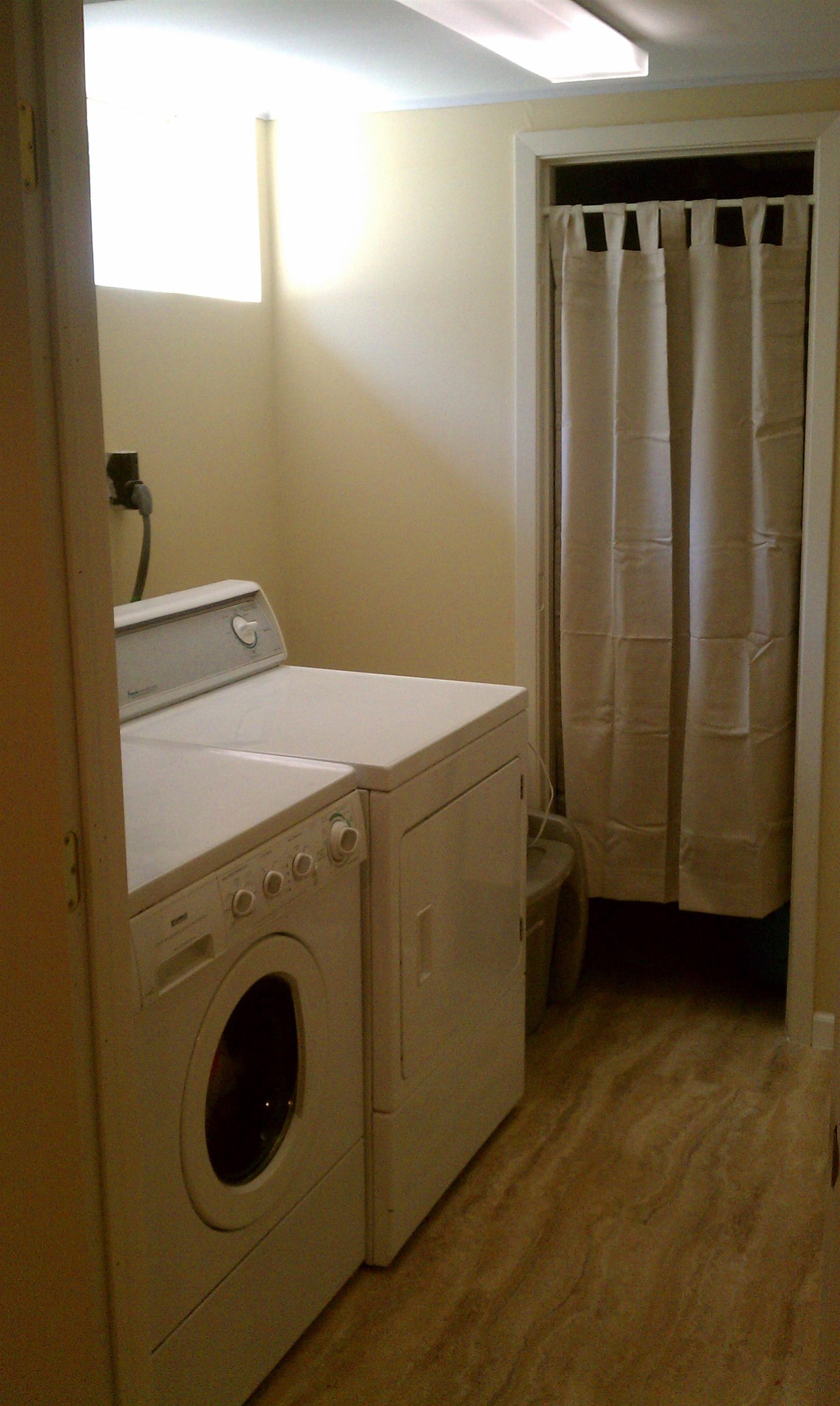 937 West Arrowhead Road Duluth, MN 55811 - Photo 15 of 23 Laundry room washer and dryer and light wood-type flooring.