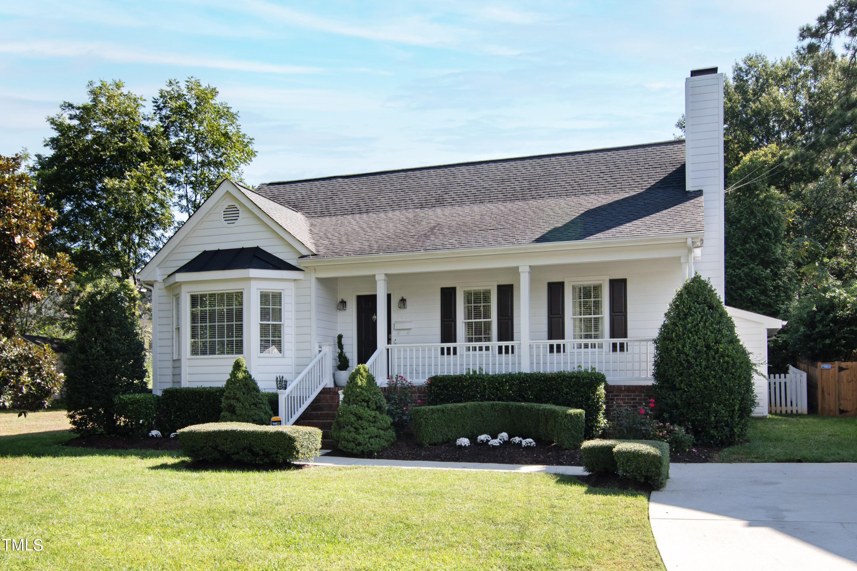 1816 Ridley Street Raleigh, NC 27608 - Photo 1 of 40 a front view of a house with a yard