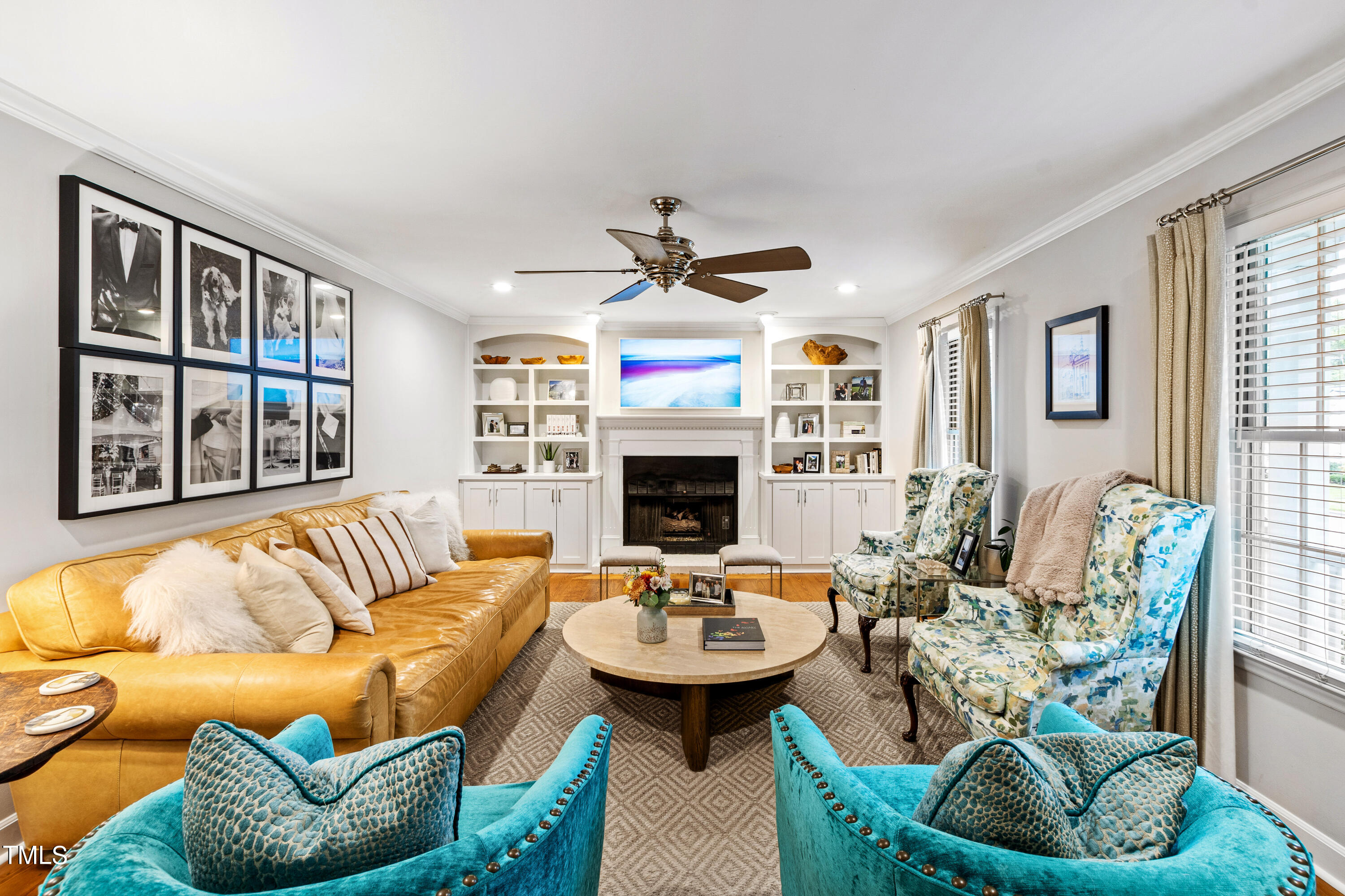 1816 Ridley Street Raleigh, NC 27608 - Photo 2 of 40 a living room with furniture fireplace and a large window