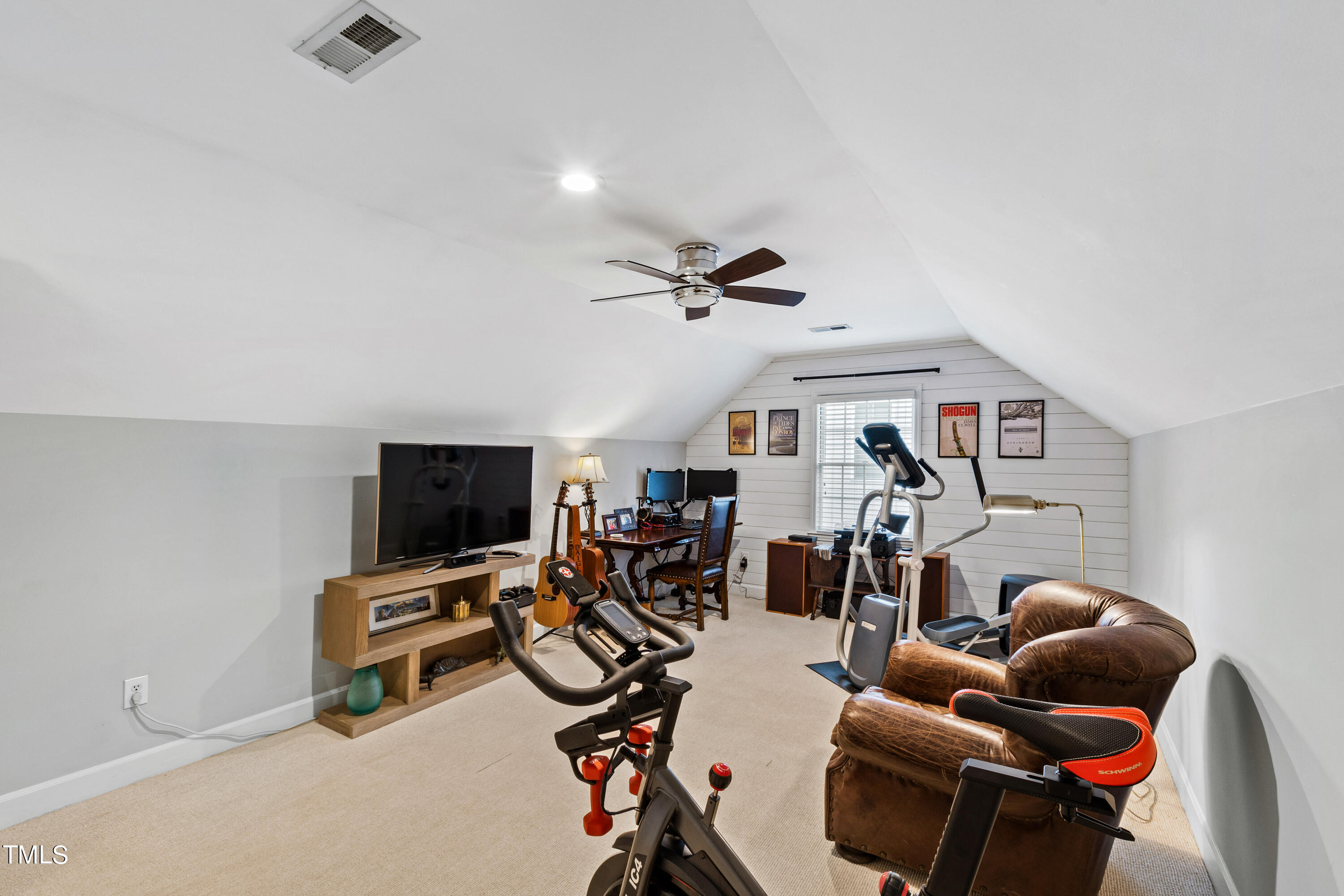 1816 Ridley Street Raleigh, NC 27608 - Photo 34 of 40 a view of a livingroom with furniture and a flat screen tv
