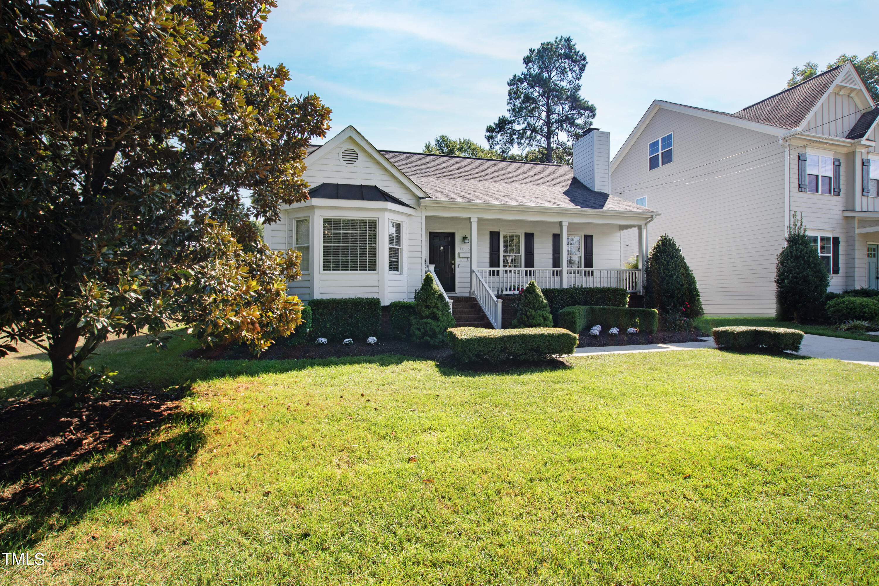 1816 Ridley Street Raleigh, NC 27608 - Photo 6 of 40 a view of a house with swimming pool and a yard