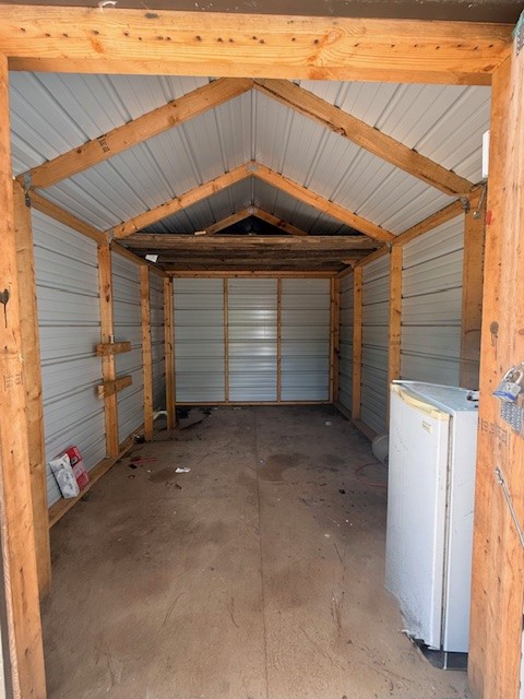 58 Roy Webb Road Huntsville, TX 77320 - Photo 28 of 31 View inside the metal storage shed that is located by the manufactured home electric pole.