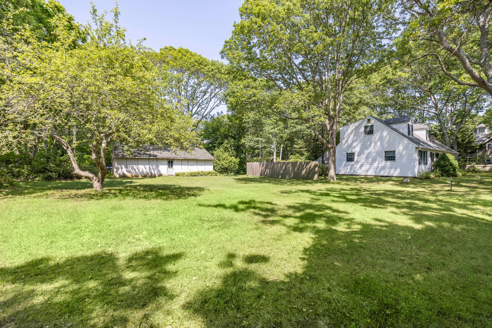 95 Sayre's Path Wainscott, NY 11975 - Photo 7 of 14 a view of a house with a yard