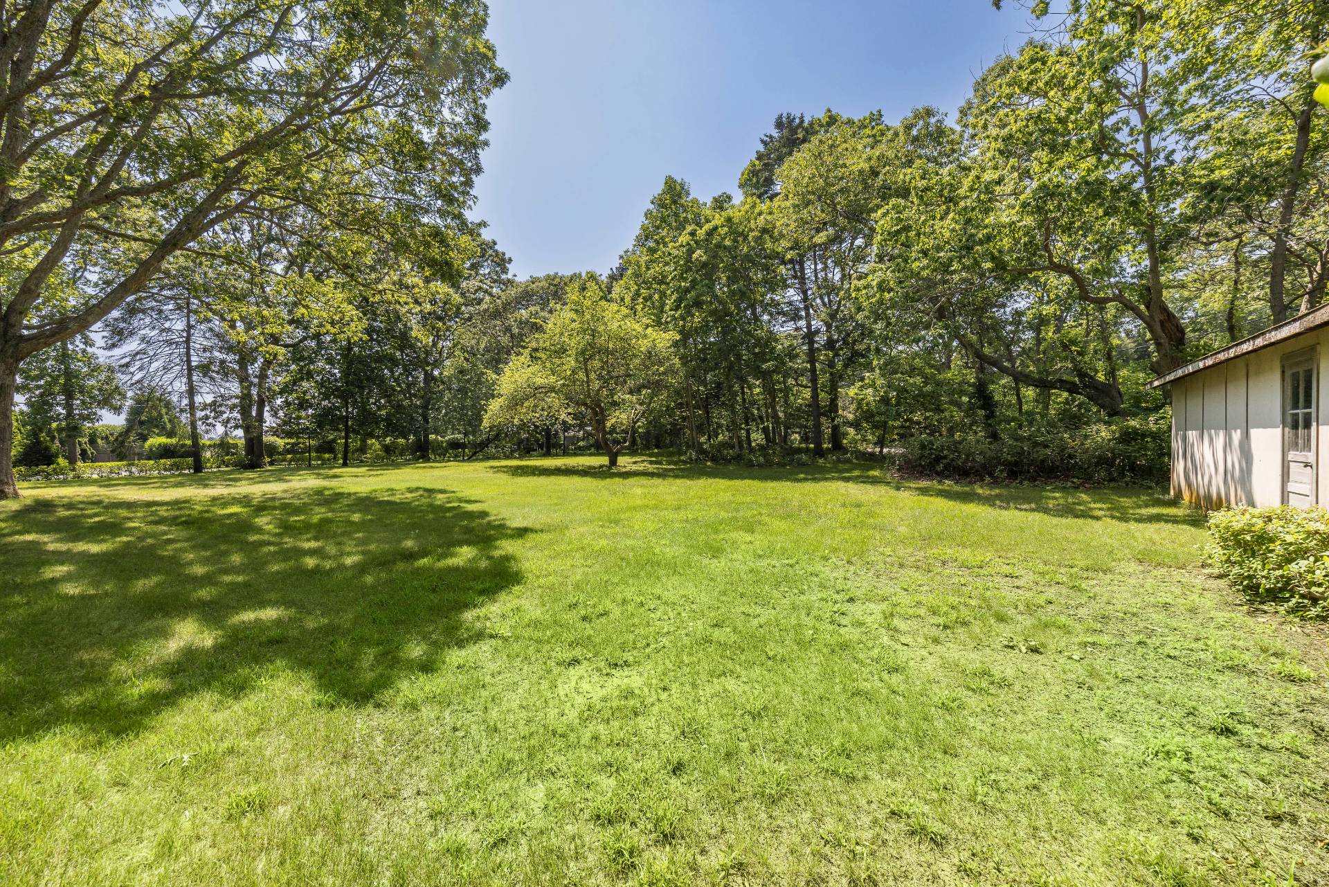 95 Sayre's Path Wainscott, NY 11975 - Photo 8 of 14 a view of outdoor space with deck and yard