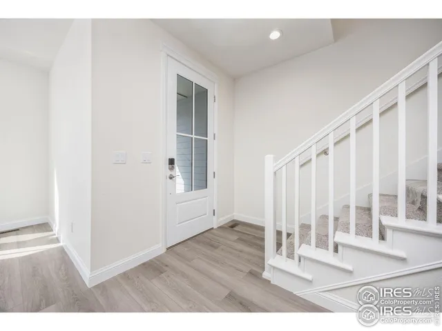 a view interior of a house with wooden floor and windows