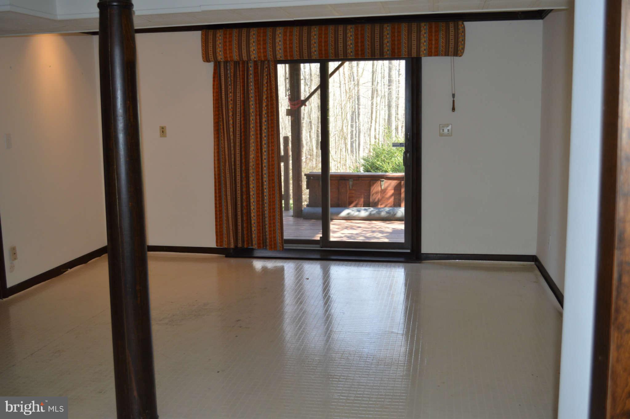 1679 Irishtown Road Elkton, MD 21921 - Photo 21 of 30 Family Room open to LL deck running width of house