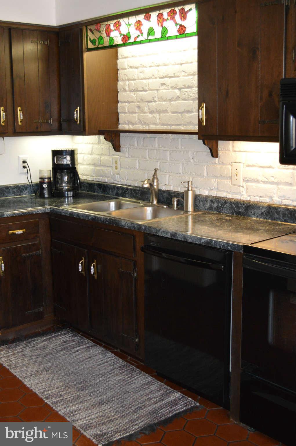 1679 Irishtown Road Elkton, MD 21921 - Photo 6 of 30 Ceramic tile, stainless sink, adjacent dishwasher