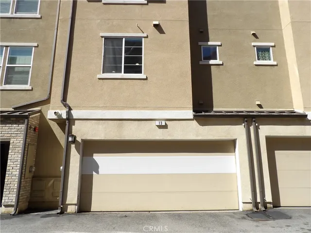 a view of a street with a building