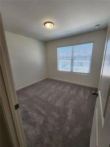 a bathroom with a double vanity sink toilet and shower