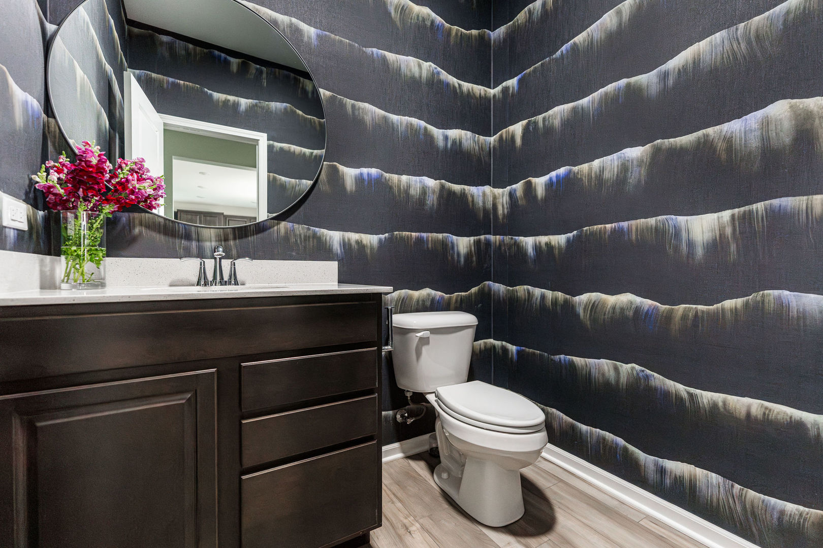 16230 Lake View Road Plainfield, IL 60586 - Photo 13 of 62 a bathroom with a toilet and a sink