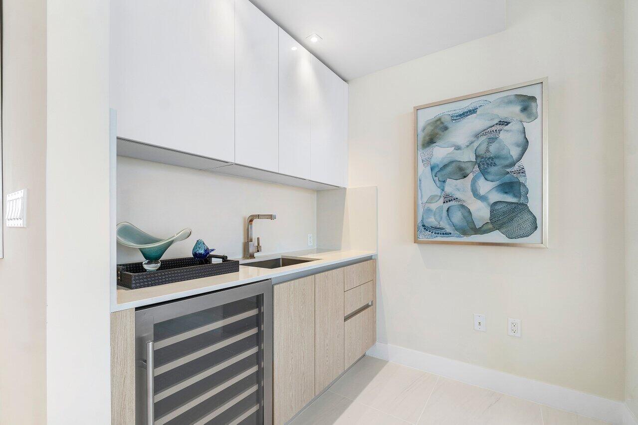 3100 North Ocean Drive, Unit 1505 Riviera Beach, FL 33404 - Photo 12 of 60 a bathroom with a sink and a mirror