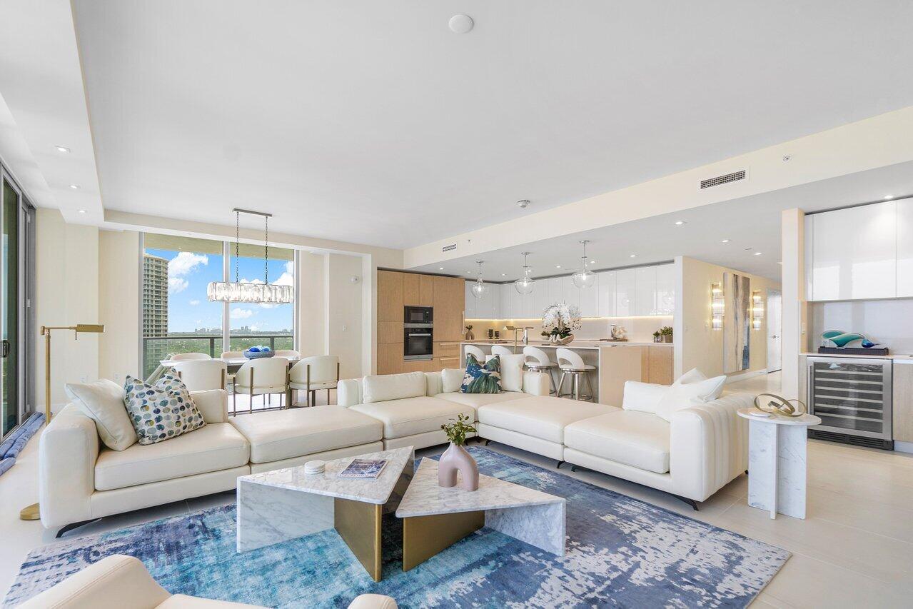 3100 North Ocean Drive, Unit 1505 Riviera Beach, FL 33404 - Photo 14 of 60 a living room with furniture wooden floor and a large window