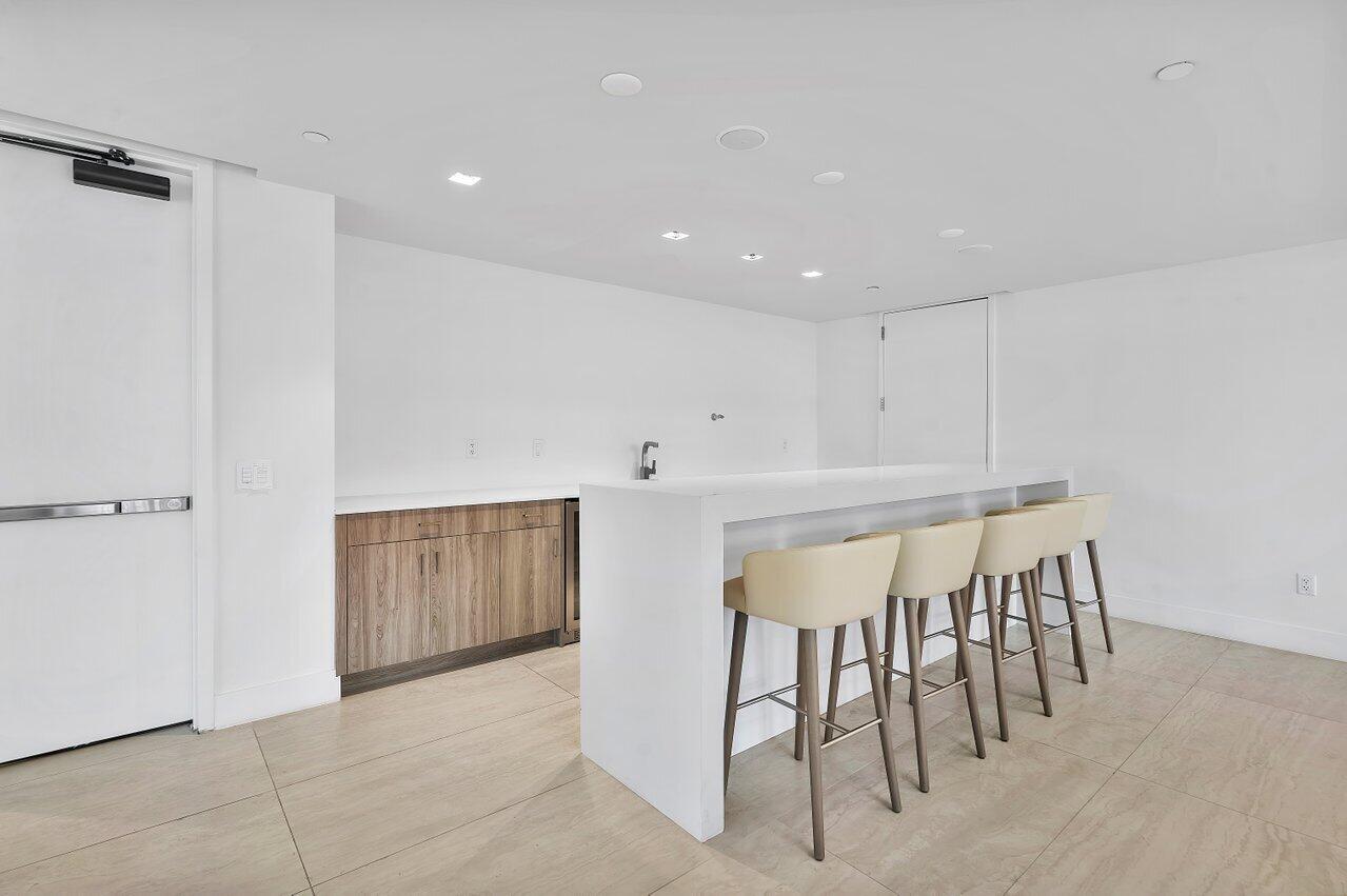 3100 North Ocean Drive, Unit 1505 Riviera Beach, FL 33404 - Photo 43 of 60 a view of kitchen with furniture and wooden floor
