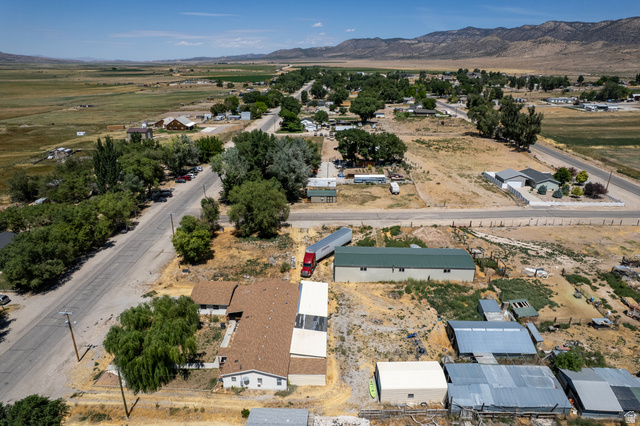 445 South Main Street Fayette, UT 84630 - Photo 6 of 45 Aerial view of property and surrounding area featuring mountains