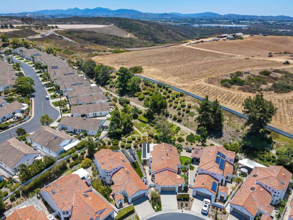 4939 Tilos Way Oceanside, CA 92056 - Photo 35 of 49 an aerial view of residential houses with outdoor space