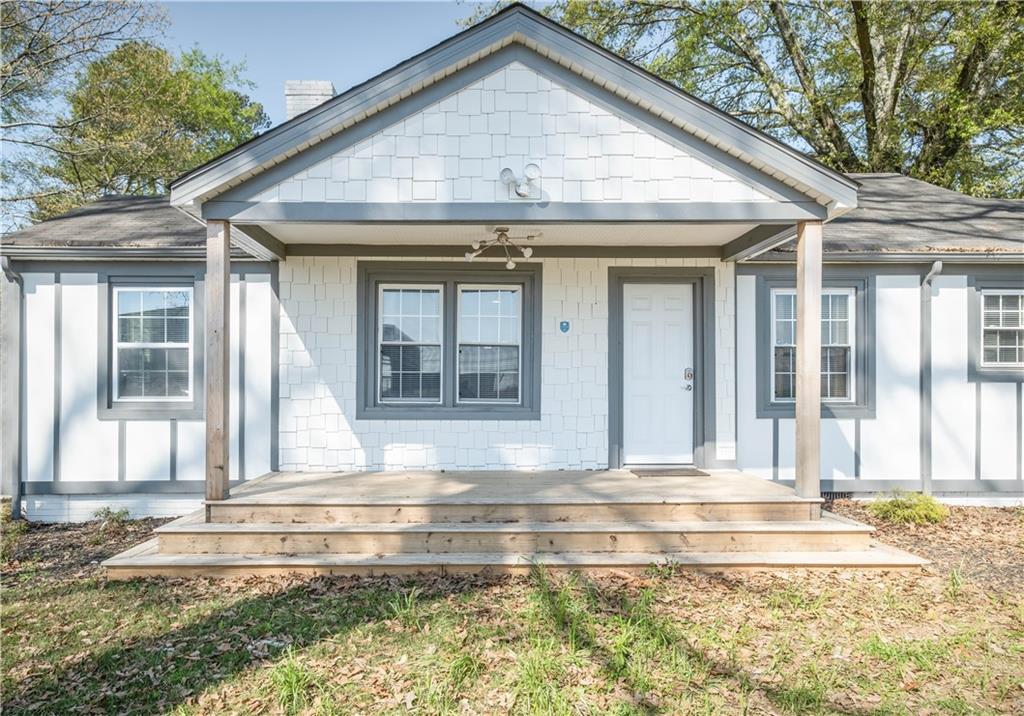 a view of a house with a swimming pool