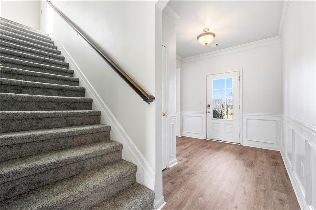 677 Massey Street Winder, GA 30680 - Photo 4 of 30 a view of entryway and hall with wooden floor