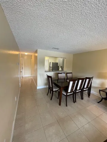 a view of outdoor space with deck and green space