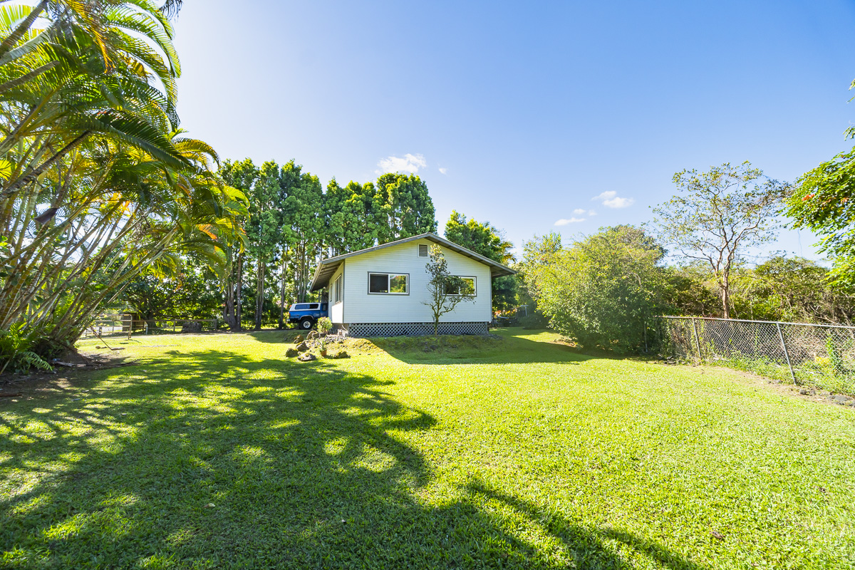 420 Ainalako Road Hilo, HI 96720 - Photo 15 of 20 a house with a yard