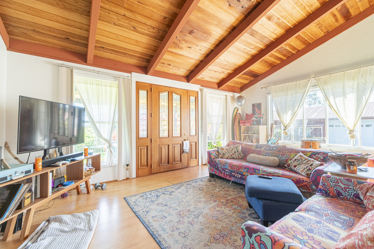 420 Ainalako Road Hilo, HI 96720 - Photo 6 of 20 a living room with furniture and a flat screen tv