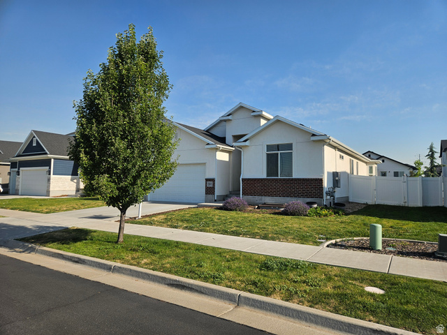2508 Sunset Way Layton, UT 84041 - Photo 1 of 35 Contemporary single-story residence with white siding and brick accents