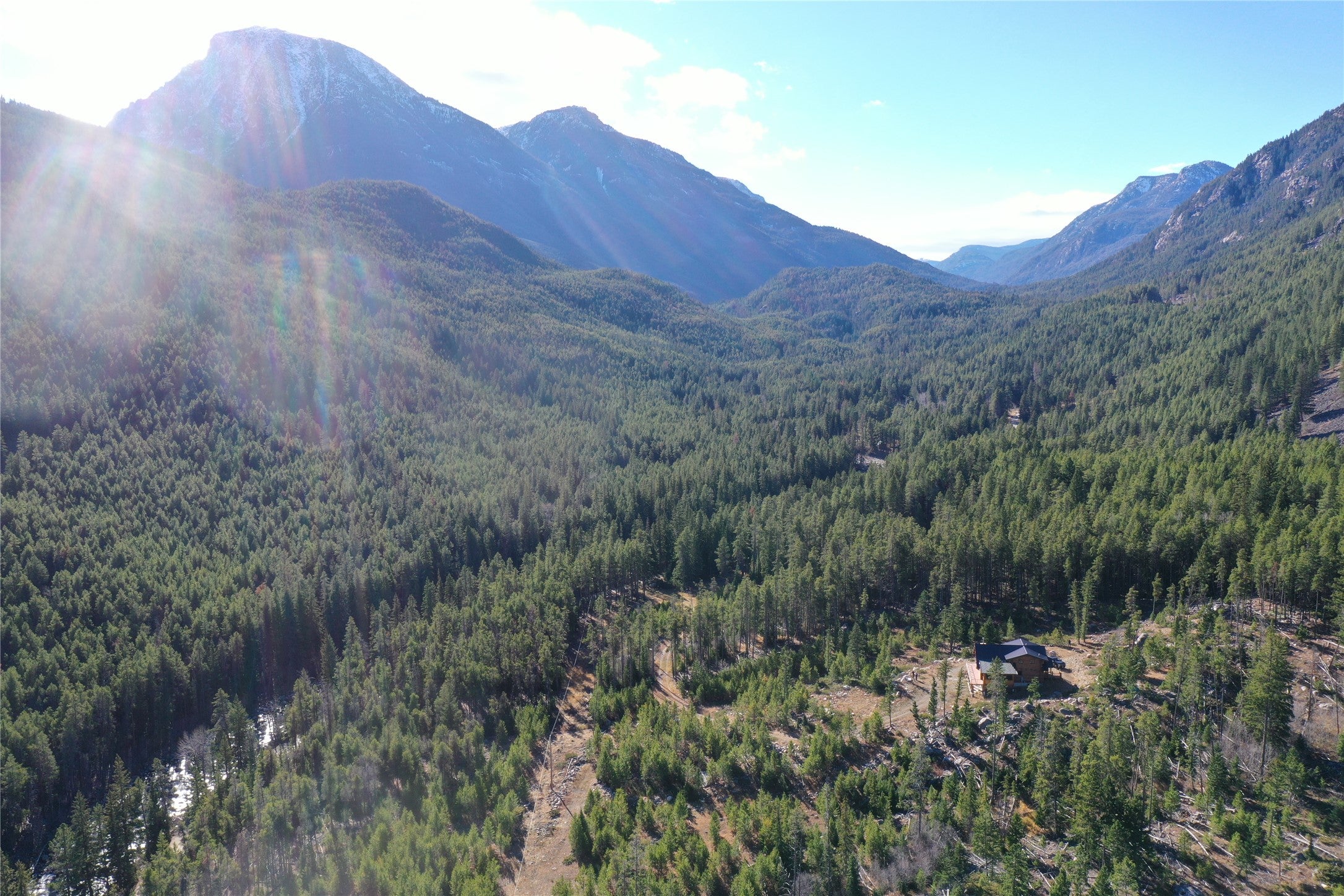 3916 Main Boulder Road McLeod, MT 59052 - Photo 14 of 38 View of mountain backdrop featuring a heavily wooded area