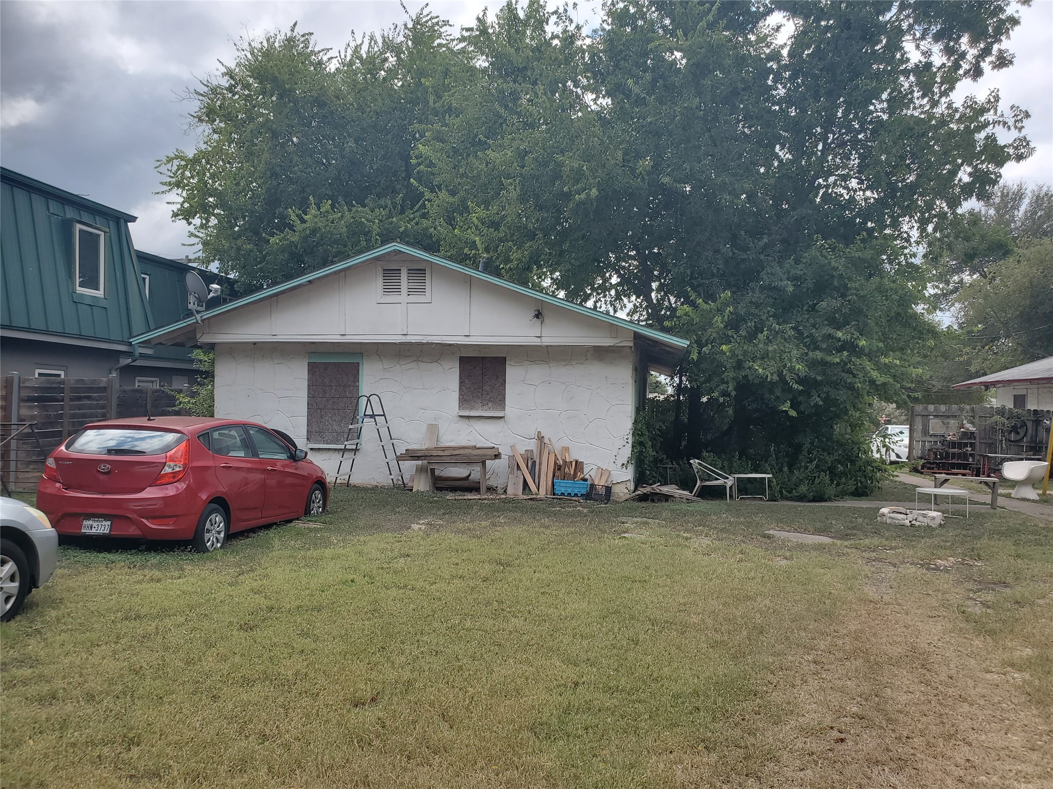 2610 Rogers Avenue Austin, TX 78722 - Photo 15 of 15 View of front of home with a front yard and concrete block siding
