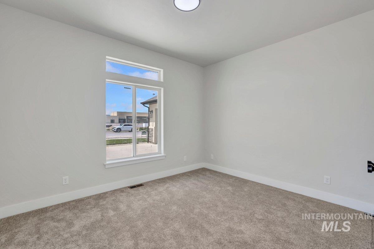 951 Gregory Way Twin Falls, ID 83301 - Photo 21 of 31 Carpeted empty room with baseboards