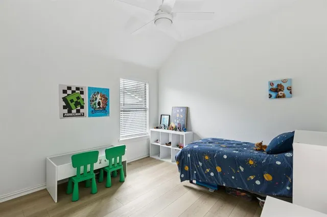 a living room with furniture and a chair