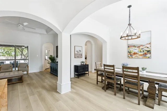a view of a livingroom with furniture and a window