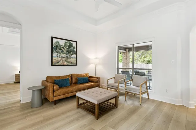 a living room with furniture and a window