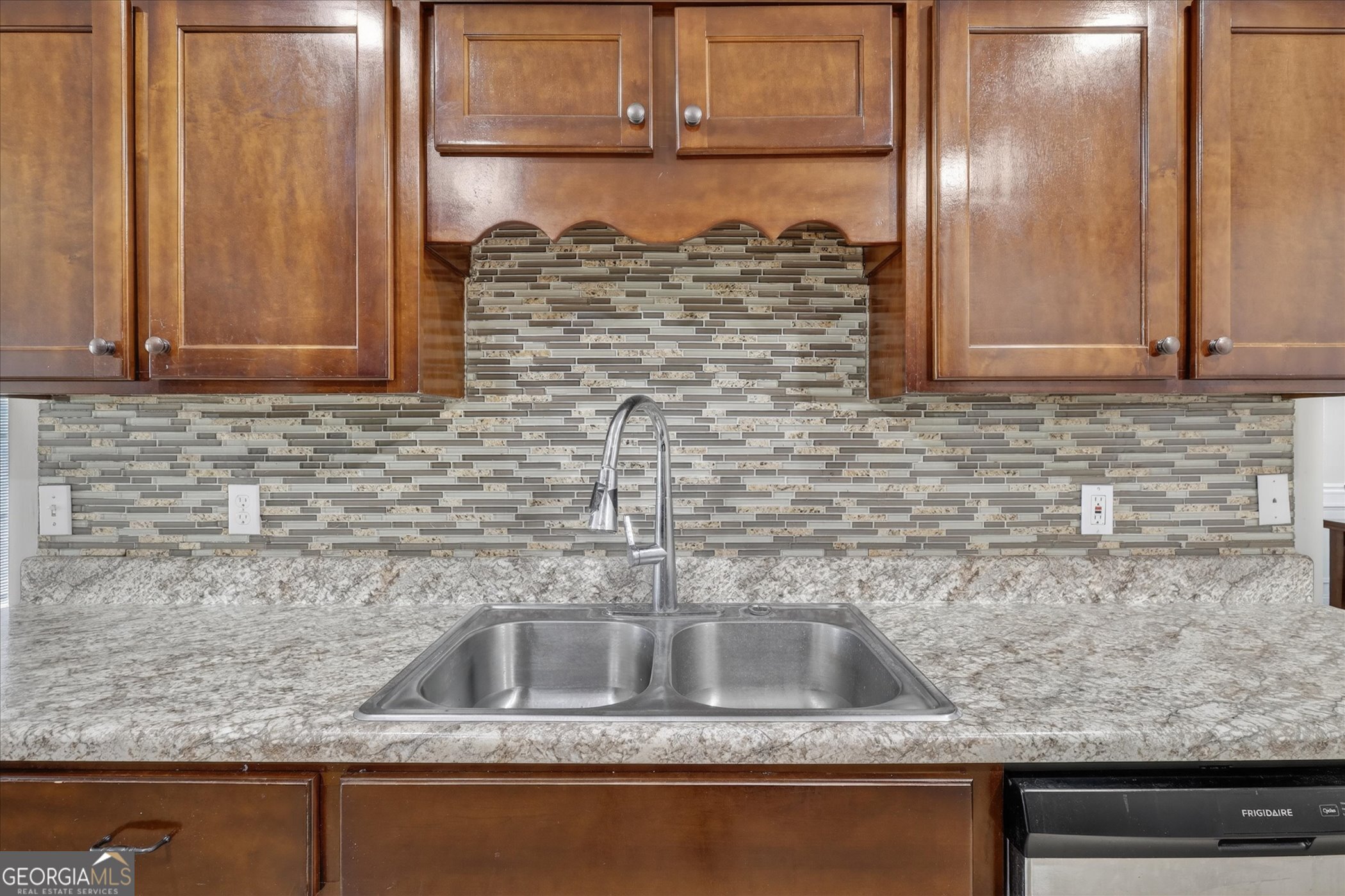 245 Stonebrook Way Statesboro, GA 30458 - Photo 13 of 32 a close view of sink and tap