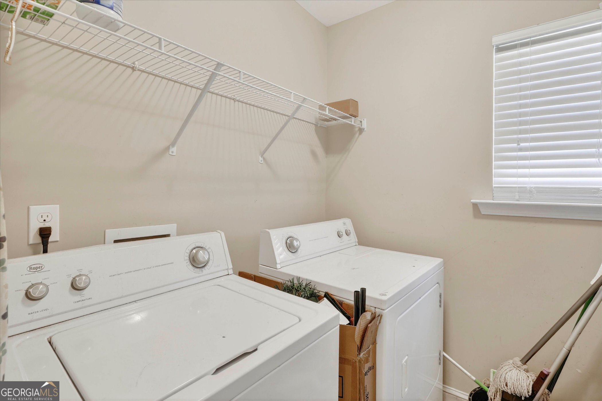245 Stonebrook Way Statesboro, GA 30458 - Photo 23 of 32 a utility room with dryer and washer