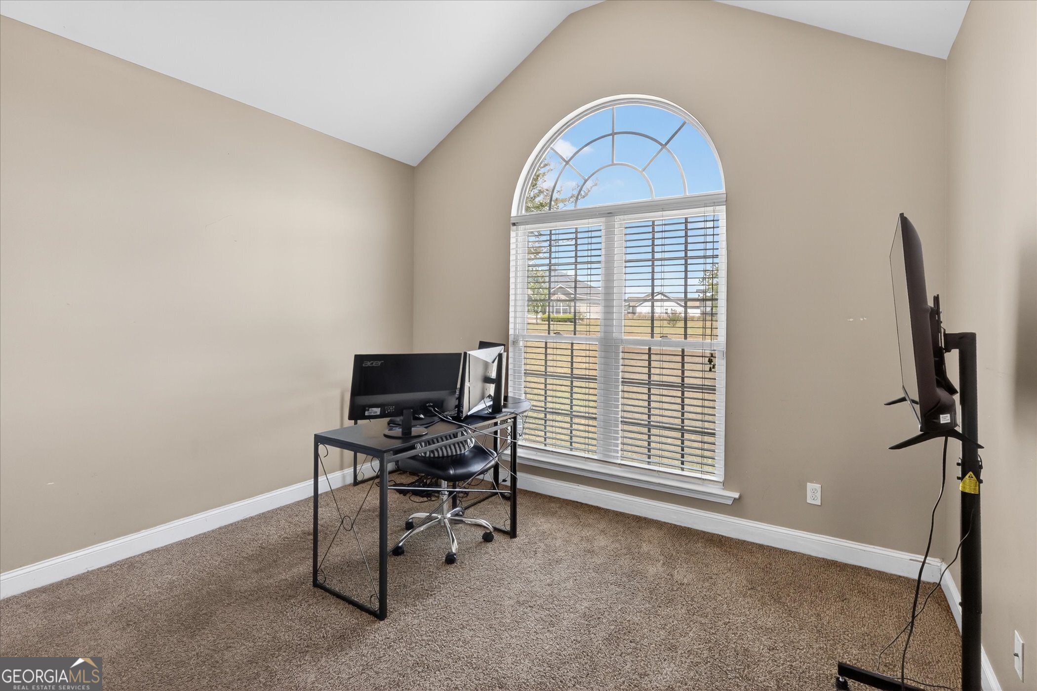 245 Stonebrook Way Statesboro, GA 30458 - Photo 24 of 32 a view of a livingroom with a window and couch