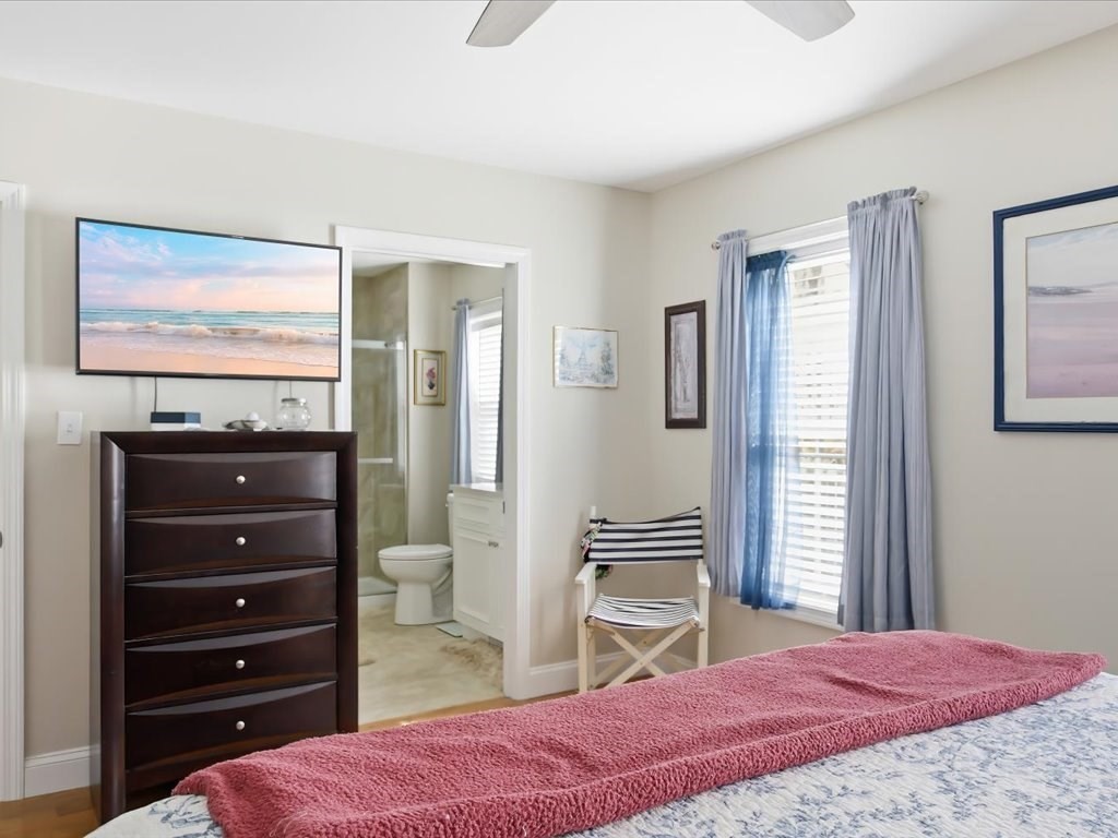 67 Ling Street Fall River, MA 02720 - Photo 15 of 32 a bedroom with a bed and a flat screen tv