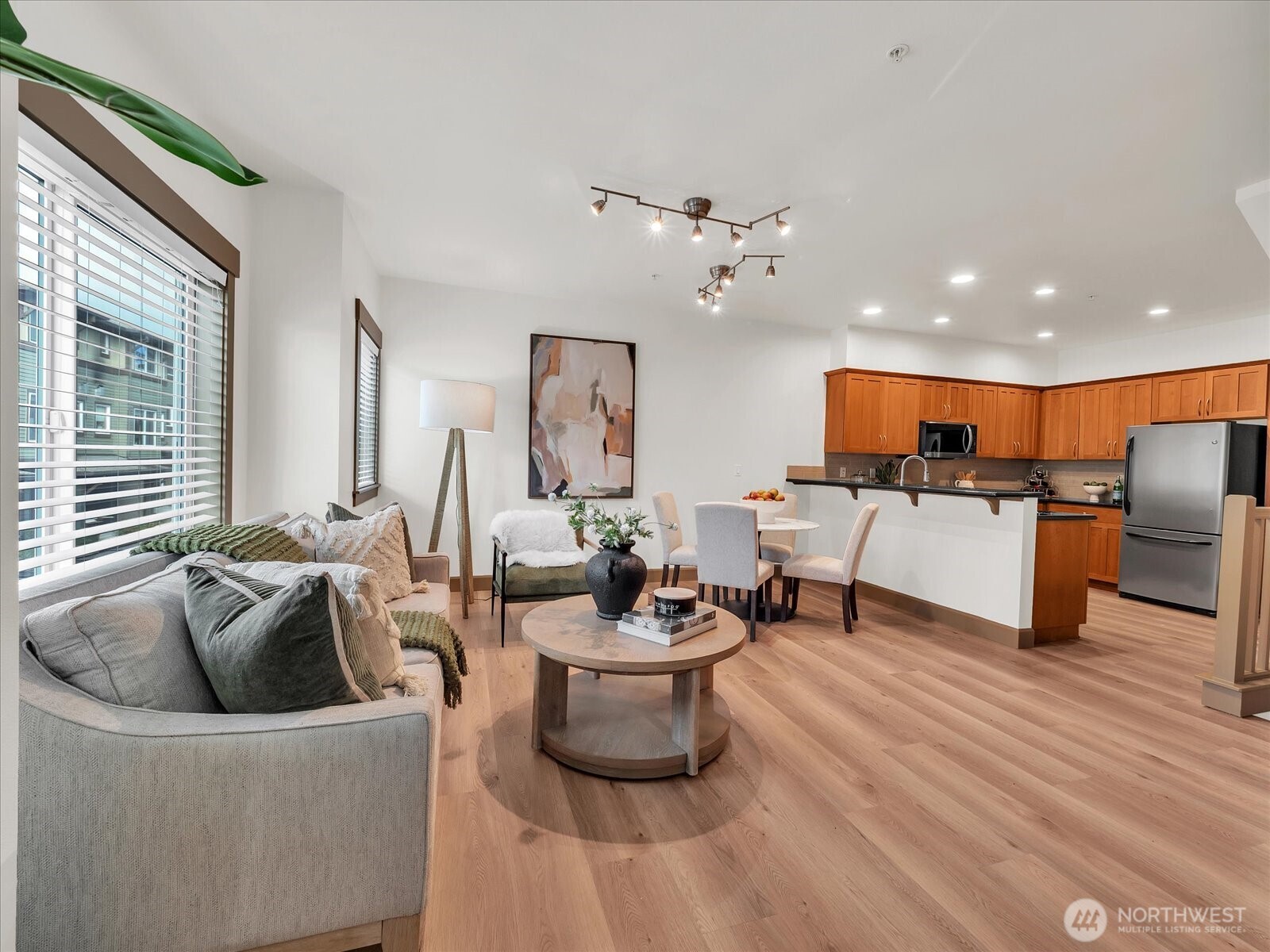 2115 201st Place Southeast, Unit K2 Bothell, WA 98012 - Photo 7 of 28 a living room with furniture and kitchen view