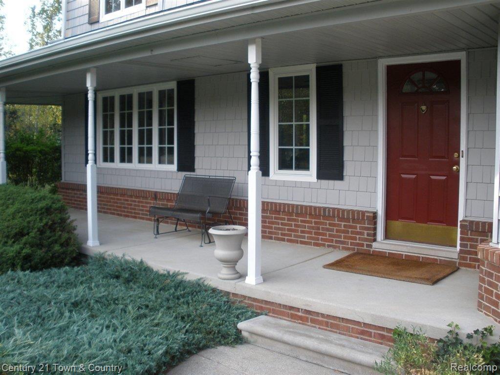 8280 Kier Road Clarkston, MI 48348 - Photo 10 of 25 Wrap around covered front porch