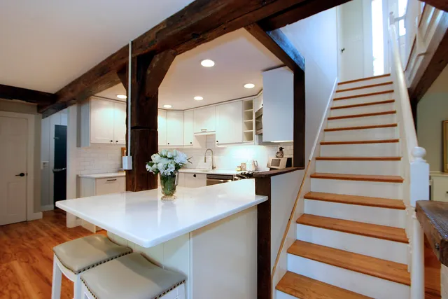 a bed room with a bed and wooden floor