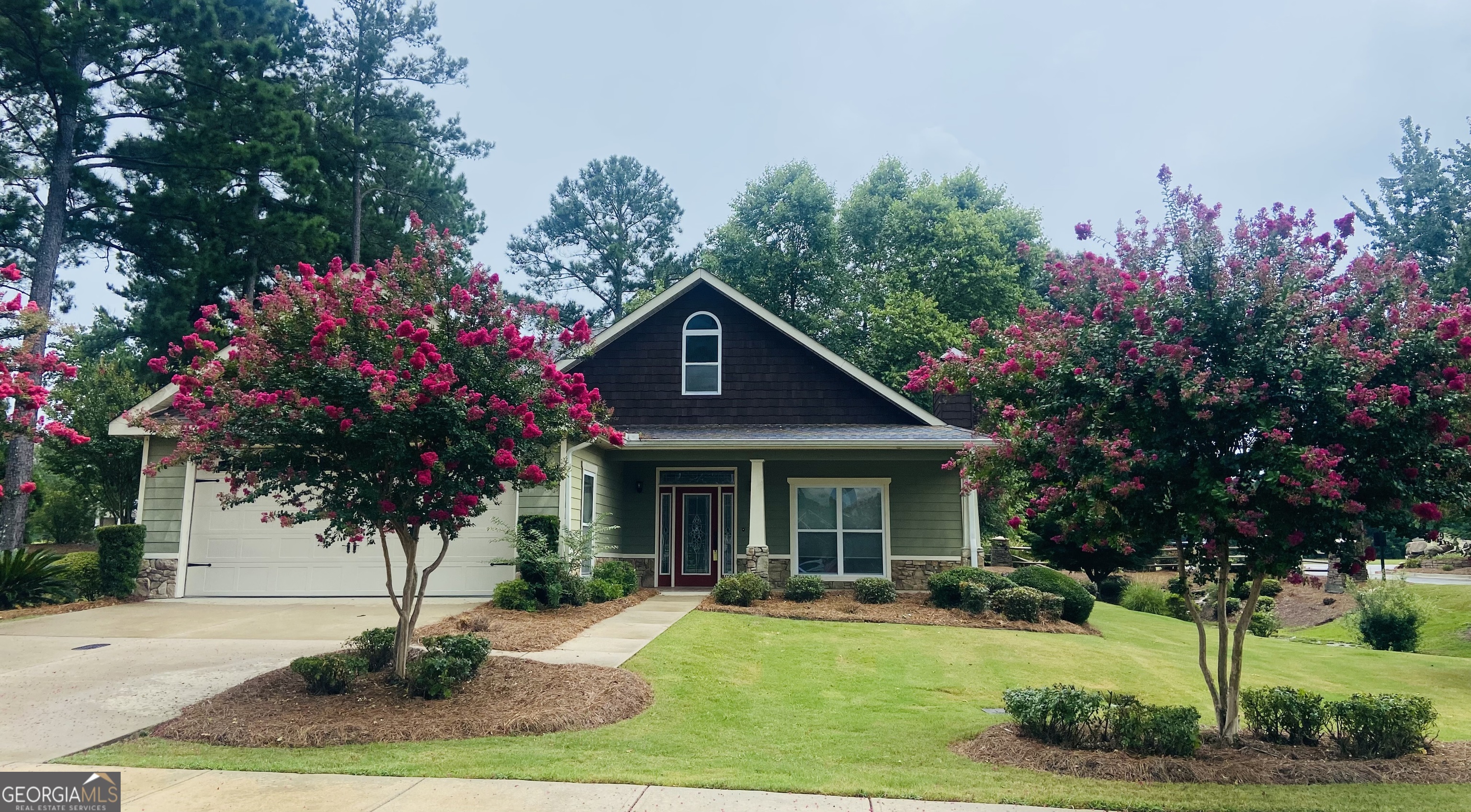 401 Cherokee Rose Circle Dublin, GA 31021 - Photo 1 of 1 a front view of a house with a yard and garage