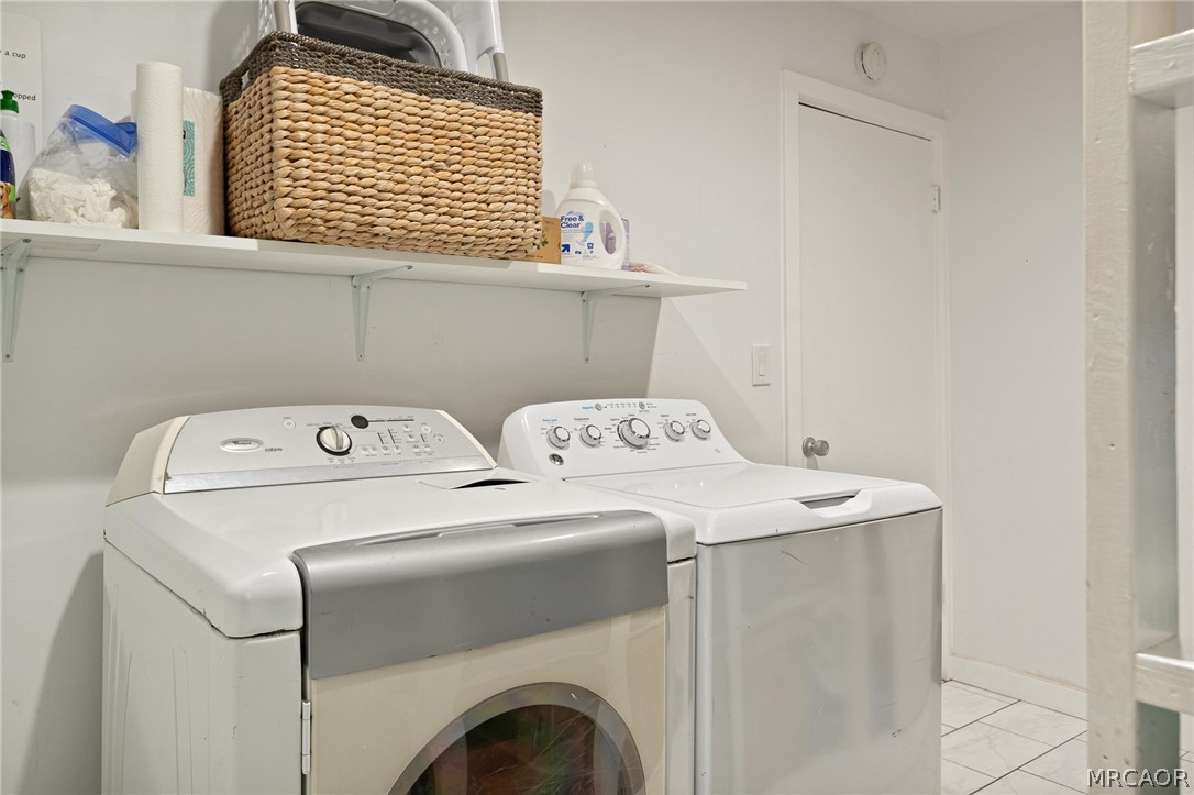 316 Pioneer Road Lake Arrowhead, CA 92352 - Photo 29 of 35 a utility room with dryer and washer