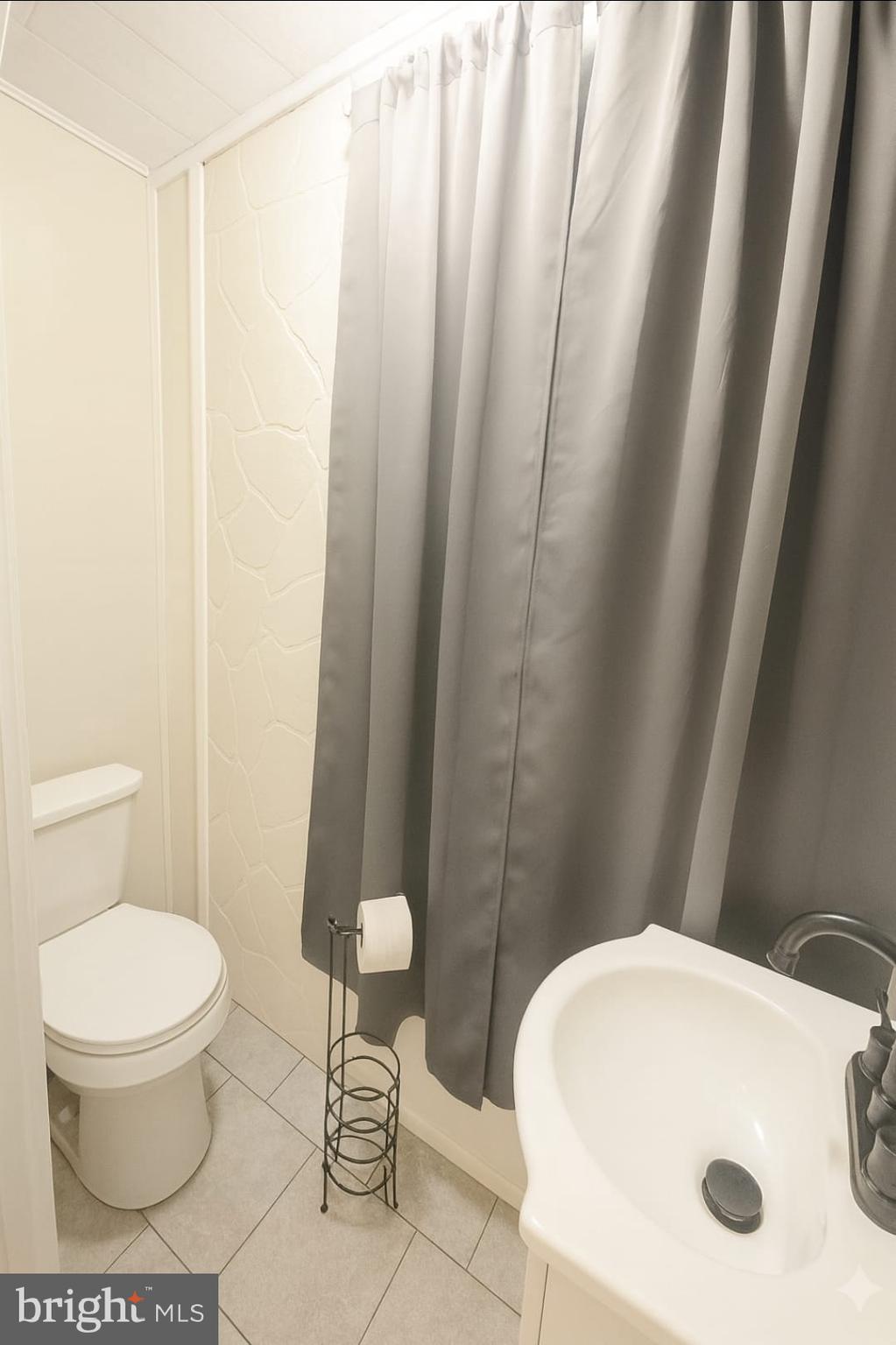 2622 Perkiomen Avenue Reading, PA 19606 - Photo 17 of 27 a bathroom with a sink and a toilet