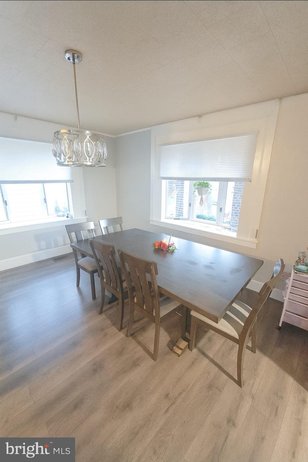2622 Perkiomen Avenue Reading, PA 19606 - Photo 8 of 27 a dining room with wooden floor a glass table and chairs