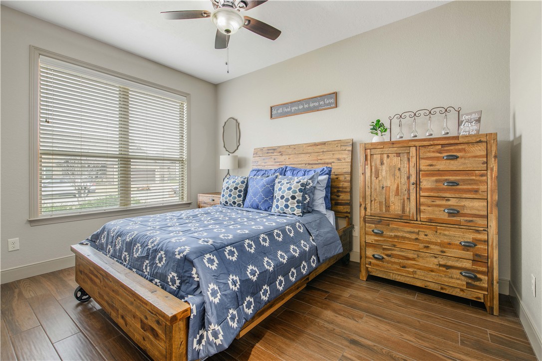 3049 Embers Loop Bryan, TX 77808 - Photo 15 of 21 a bedroom with a bed and a window