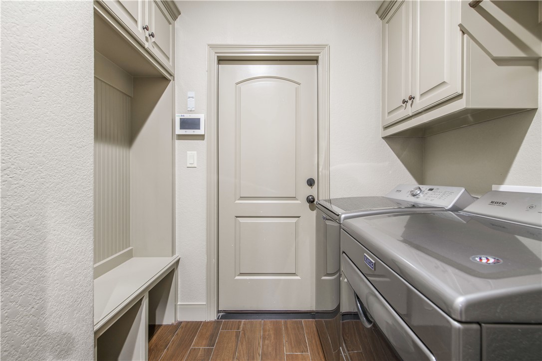 3049 Embers Loop Bryan, TX 77808 - Photo 19 of 21 a kitchen with a sink and a refrigerator